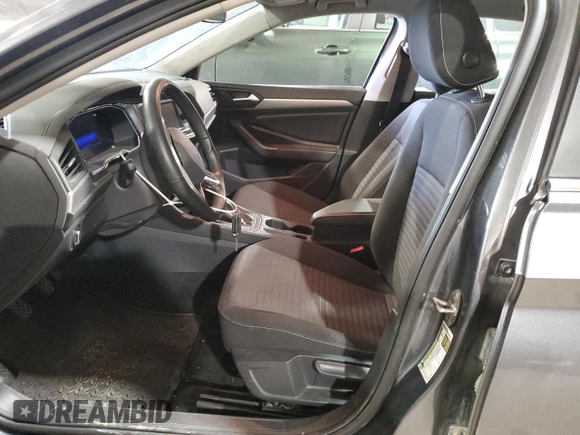 2023 Volkswagen Jetta S with VIN 3VW4M7BU7PM026209, listed as a Copart auction lot 83806134 with 9,427 mi miles and Salvage title. Bid and sale history available at DreamBid. Image 7.