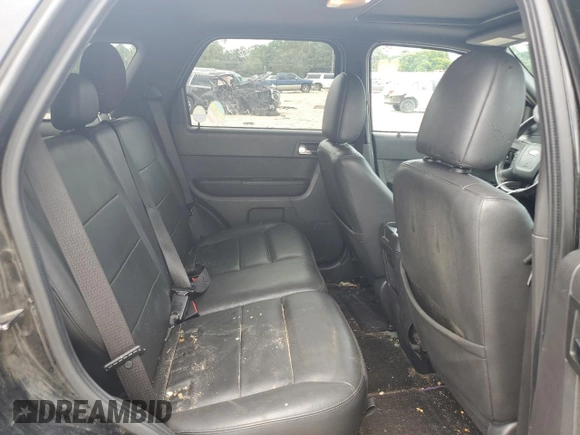 2010 Ford Escape Limited with VIN 1FMCU0E73AKD37125, listed as a Copart auction lot 59763495 with 203,823 mi miles and Salvage title. Bid and sale history available at DreamBid. Image 11.