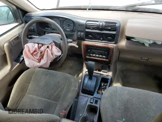 2001 Isuzu Rodeo S with VIN 4S2CK58W514313783, listed as a Copart auction lot 63038984 with 179,628 mi miles and Clean Title. Bid and sale history available at DreamBid. Image 8.