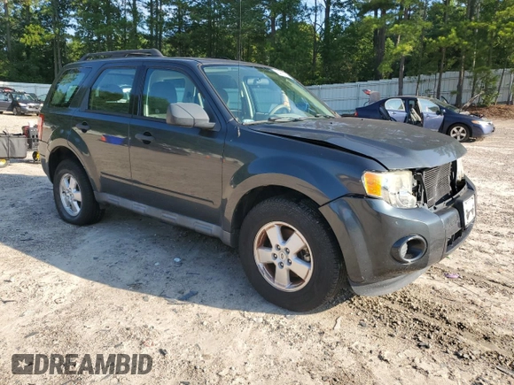 2009 Ford Escape XLS with VIN 1FMCU02739KD07929, listed as a Copart auction lot 64861745 with 144,914 mi miles and Clean title. Bid and sale history available at DreamBid. Image 4.