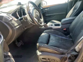 2012 Cadillac SRX Performance Collection with VIN 3GYFNBE34CS609643, listed as a Copart auction lot 57223065 with 182,072 mi miles and Salvage title. Bid and sale history available at DreamBid. Image 7.