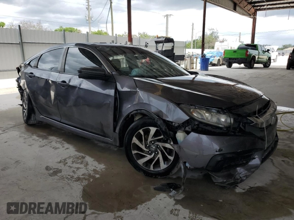 2017 Honda Civic LX with VIN 19XFC2F56HE206118, listed as a Copart auction lot 58777885 with 59,710 mi miles and Salvage title. Bid and sale history available at DreamBid. Image 4.