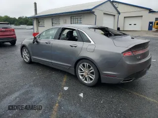 2014 Lincoln MKZ Hybrid with VIN 3LN6L2LU0ER826264, listed as a Copart auction lot 61228035 with 66,857 mi miles and Salvage title. Bid and sale history available at DreamBid. Image 2.