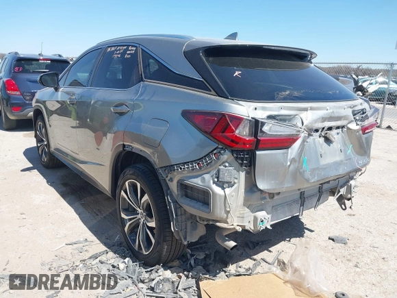 2020 Lexus RX 350 with VIN 2T2HZMAA3LC168454, listed as a IAAI auction lot 41822626 with 91,096 mi miles and . Bid and sale history available at DreamBid. Image 3.
