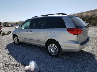 2010 Toyota Sienna XLE z VIN 5TDDK4CC8AS033268, wystawiony jako Copart lot #48503455 z przebiegiem 134 959 mil mil oraz Szkoda całkowita • Salvage title. Historia ofert i sprzedaży dostępna na DreamBid. Obrazek 2.
