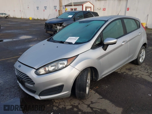 2019 Ford Fiesta SE z VIN 3FADP4EJ7KM147864, wystawiony jako IAAI lot #41692160 z przebiegiem 87 417 mil mil oraz . Historia ofert i sprzedaży dostępna na DreamBid. Obrazek 17.