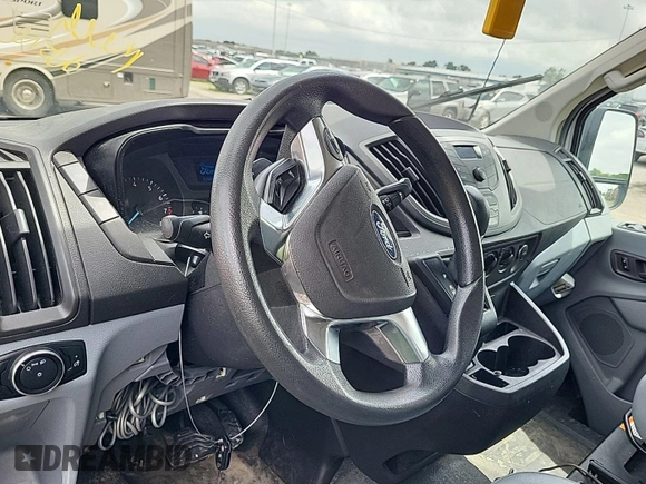 2016 Ford Transit Cargo with VIN 1FTYE1ZM1GKA06047, listed as a IAAI auction lot 42679265 with 124,601 mi miles and . Bid and sale history available at DreamBid. Image 25.