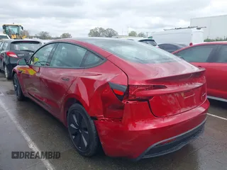 2025 Tesla Model 3 Long Range with VIN 5YJ3E1EB9SF928781, listed as a IAAI auction lot 41870681 with 261 mi miles and . Bid and sale history available at DreamBid. Image 3.