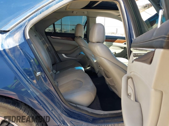 2009 Cadillac CTS RWD with VIN 1G6DV57V990146995, listed as a IAAI auction lot 41209631 with 172,229 mi miles and . Bid and sale history available at carsss.com. Image 8.