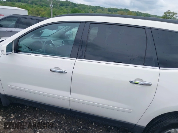 2014 Chevrolet Traverse LT with VIN 1GNKRGKD6EJ273783, listed as a IAAI auction lot 42103544 with 107,179 mi miles and . Bid and sale history available at DreamBid. Image 15.