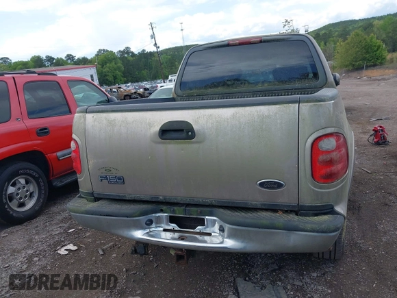 2003 Ford F-150 XLT with VIN 1FTRW08L63KD06455, listed as a IAAI auction lot 41988549 with 138,168 mi miles. Bid and sale history available at carsss.com. Image 16.