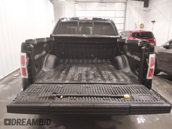 2011 Ford F-150 XLT with VIN 1FTFW1ET3BFC27328, listed as a IAAI auction lot 41557103 with 117,966 mi miles. Bid and sale history available at carsss.com. Image 12.