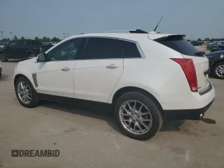 2013 Cadillac SRX Performance Collection with VIN 3GYFNDE30DS568330, listed as a Copart auction lot 59057005 with 163,817 mi miles and Salvage title. Bid and sale history available at DreamBid. Image 2.