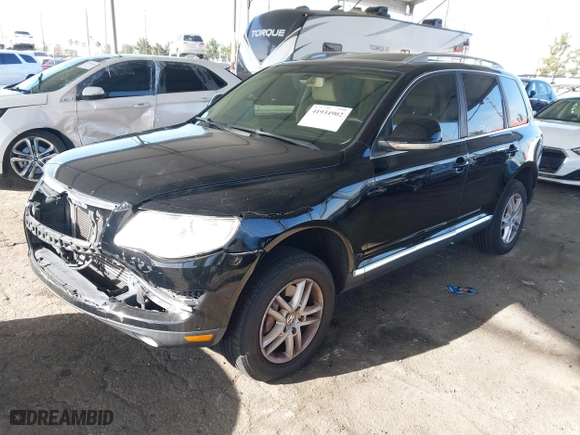 2008 Volkswagen Touareg 2 V6 with VIN WVGBE77L98D076917, listed as a IAAI auction lot 41934902 with 193,481 mi miles. Bid and sale history available at carsss.com. Image 17.