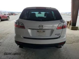 2012 Mazda CX-9 Grand Touring with VIN JM3TB3DV2C0336355, listed as a Copart auction lot 61687975 with 150,580 mi miles and Salvage title. Bid and sale history available at DreamBid. Image 6.