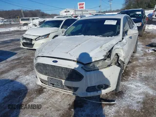 2013 Ford Fusion SE Hybrid with VIN 3FA6P0LU8DR272165, listed as a IAAI auction lot 41333539 with 196,843 mi miles. Bid and sale history available at carsss.com. Image 2.