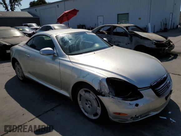 2002 Lexus SC 430 with VIN JTHFN48Y720029932, listed as a Copart auction lot 69795974 with 146,548 mi miles and Salvage Title. Bid and sale history available at DreamBid. Image 4.