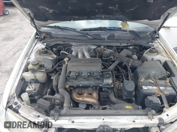 2001 Toyota Camry LE z VIN JT2BF22K310304712, wystawiony jako IAAI lot #42386743 z przebiegiem 103 552 mil mil oraz . Historia ofert i sprzedaży dostępna na DreamBid. Obrazek 10.