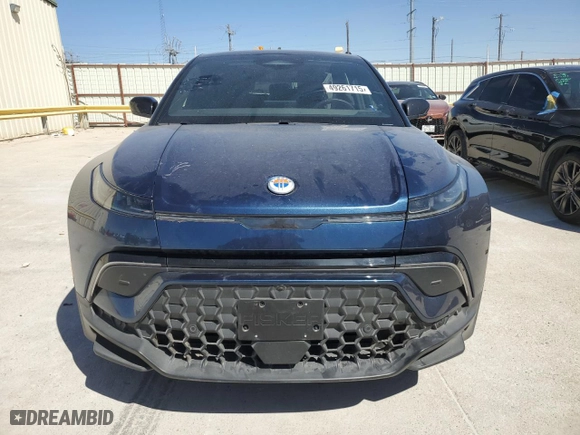 2023 Fisker Ocean Ultra with VIN VCF1UBU26PG009142, listed as a Copart auction lot 49261715 with 7,045 mi miles and Salvage Title. Bid and sale history available at carsss.com. Image 5.