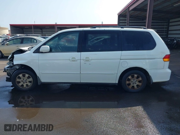 2002 Honda Odyssey EX z VIN 2HKRL18632H556791, wystawiony jako IAAI lot #41562553 z przebiegiem 222 976 mil mil oraz . Historia ofert i sprzedaży dostępna na DreamBid. Obrazek 15.