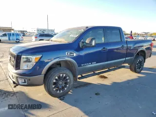 2016 Nissan Titan XD PRO-4X with VIN 1N6BA1F40GN515886, listed as a Copart auction lot 80798594 with 172,004 mi miles and Clean Title. Bid and sale history available at carsss.com. Image 1.