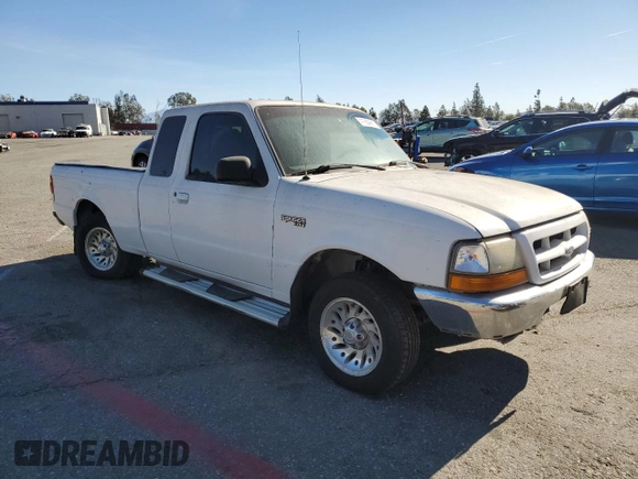 1999 Ford Ranger XLT with VIN 1FTYR14X6XPA45855, listed as a Copart auction lot 41889965 with 221,848 mi miles and Salvage Title. Bid and sale history available at DreamBid. Image 4.