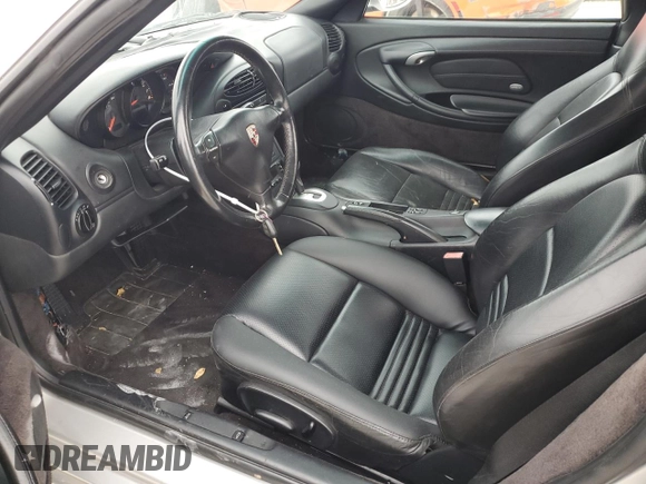 2001 Porsche Boxster с VIN WP0CA29821U621779, выставлен на аукционе Copart как лот 87204984 с пробегом 82 091 миль миль и Списание • Salvage title. История ставок и продаж доступна на DreamBid. Изображение 7.