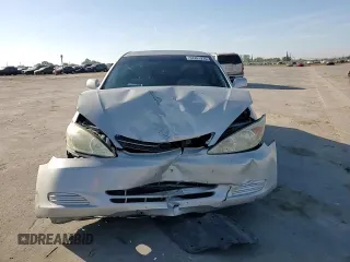 2004 Toyota Camry LE with VIN 4T1BE32K24U265992, listed as a Copart auction lot 53761975 with 97,006 mi miles and Salvage Title. Bid and sale history available at DreamBid. Image 13.
