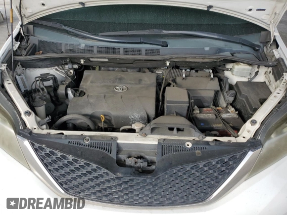 2012 Toyota Sienna SE with VIN 5TDXK3DC9CS215991, listed as a Copart auction lot 51868005 with 215,075 mi miles and Salvage title. Bid and sale history available at DreamBid. Image 13.