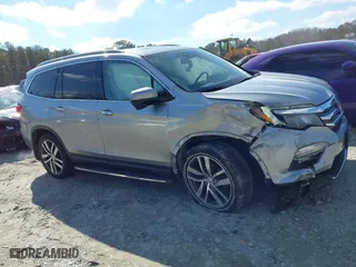 2017 Honda Pilot Touring with VIN 5FNYF6H94HB006873, listed as a IAAI auction lot 41618529 with 154,689 mi miles. Bid and sale history available at carsss.com. Image 13.