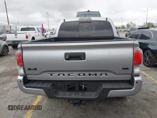 2021 Toyota Tacoma SR z VIN 3TMCZ5AN3MM374132, wystawiony jako IAAI lot #42068562 z przebiegiem 38 654 mil mil oraz . Historia ofert i sprzedaży dostępna na DreamBid. Obrazek 17.