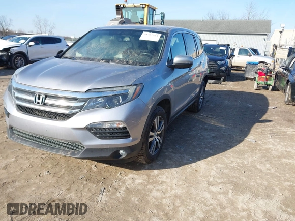2017 Honda Pilot EX-L with VIN 5FNYF6H50HB059096, listed as a IAAI auction lot 41757214 with 165,651 mi miles and . Bid and sale history available at DreamBid. Image 17.
