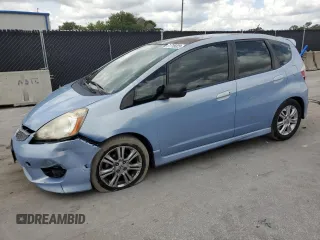 2010 Honda Fit Sport with VIN JHMGE8H64AC032634, listed as a Copart auction lot 61795825 with 143,593 mi miles and Salvage title. Bid and sale history available at DreamBid. Image 1.