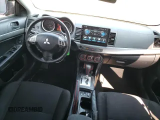 2015 Mitsubishi Lancer SE with VIN JA32V2FW3FU606202, listed as a Copart auction lot 70142394 with 129,336 mi miles and Salvage Title. Bid and sale history available at carsss.com. Image 8.
