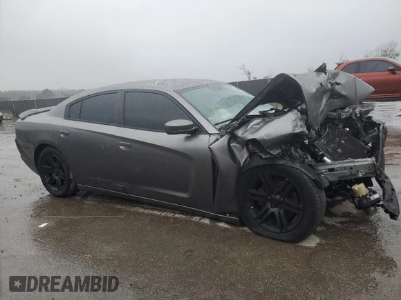 2012 Dodge Charger SXT with VIN 2C3CDXHG1CH187877, listed as a Copart auction lot 42285915 with 144,072 mi miles and Salvage Title. Bid and sale history available at DreamBid. Image 4.