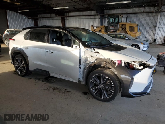 2023 Toyota bZ4X XLE with VIN JTMAAAAA7PA009698, listed as a Copart auction lot 47975935 with 15,916 mi miles and Salvage Title. Bid and sale history available at DreamBid. Image 4.