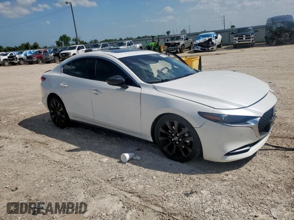 2023 Mazda 3 Premium Plus with VIN 3MZBPBEY3PM352623, listed as a Copart auction lot 63944895 with 15,645 mi miles and Salvage title. Bid and sale history available at DreamBid. Image 4.