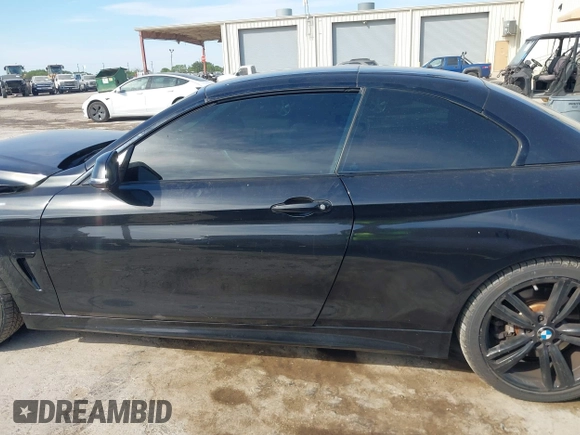 2014 BMW 4 Series 435i with VIN WBA3T3C59EP737612, listed as a IAAI auction lot 42260394 with 104,877 mi miles and . Bid and sale history available at DreamBid. Image 14.
