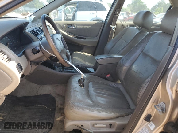 2000 Honda Accord EX z VIN 1HGCG165XYA098317, wystawiony jako Copart lot #57246705 z przebiegiem 242 166 mil mil oraz Szkoda całkowita • Salvage title. Historia ofert i sprzedaży dostępna na DreamBid. Obrazek 7.