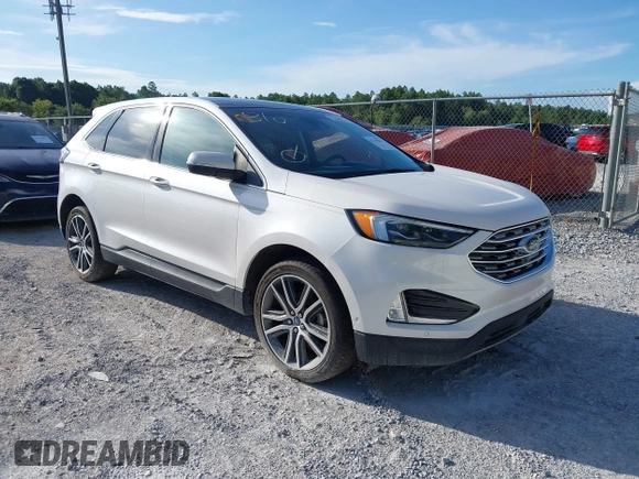 2019 Ford Edge Titanium with VIN 2FMPK3K95KBB34764, listed as a IAAI auction lot 42719541 with 128,028 mi miles and . Bid and sale history available at DreamBid. Image 1.