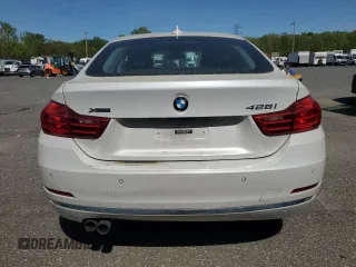 2015 BMW 4 Series 428i xDrive с VIN WBA4A7C58FD415550, выставлен на аукционе Copart как лот 55401995 с пробегом 124 666 миль миль и Чистый • Clean title. История ставок и продаж доступна на DreamBid. Изображение 6.