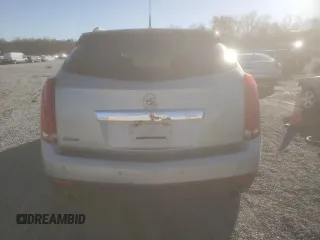 2014 Cadillac SRX Luxury Collection z VIN 3GYFNBE38ES516403, wystawiony jako Copart lot #49645375 z przebiegiem 143 769 mil mil oraz Szkody całkowita. Historia ofert i sprzedaży dostępna na DreamBid. Obrazek 6.