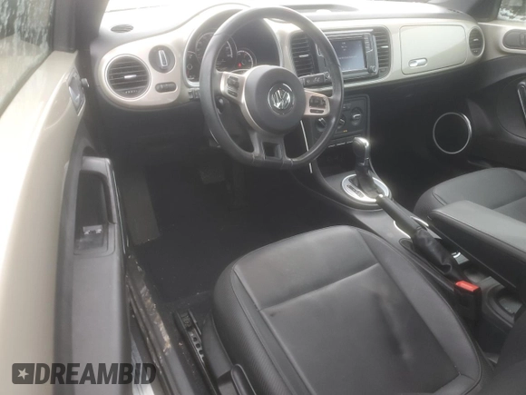 2016 Volkswagen Beetle SE with VIN 3VWJ17AT8GM604323, listed as a Copart auction lot 45710775 with 62,186 mi miles and Salvage title. Bid and sale history available at DreamBid. Image 8.