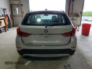 2014 BMW X1 xDrive28i z VIN WBAVL1C5XEVR95162, wystawiony jako Copart lot #55218125 z przebiegiem 108 658 mil mil oraz Szkody całkowita. Historia ofert i sprzedaży dostępna na DreamBid. Obrazek 6.