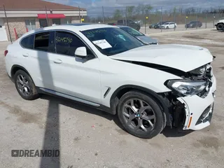 2021 BMW X4 xDrive30i with VIN 5UX2V1C03M9F12611, listed as a IAAI auction lot 42145740 with 60,417 mi miles and . Bid and sale history available at DreamBid. Image 1.