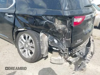 2020 Chevrolet Traverse Premier with VIN 1GNERKKW0LJ123828, listed as a IAAI auction lot 41947690 with 91,905 mi miles and . Bid and sale history available at DreamBid. Image 6.