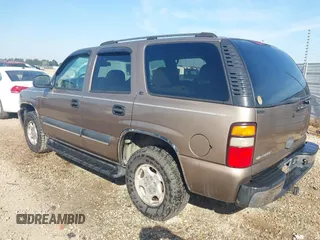 2004 Chevrolet Tahoe LT z VIN 1GNEC13Z04R130978, wystawiony jako IAAI lot #42073871 z przebiegiem 214 947 mil mil oraz . Historia ofert i sprzedaży dostępna na DreamBid. Obrazek 3.