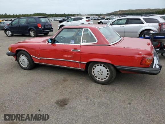 1989 Mercedes-Benz 560 SL с VIN WDBBA48D5KA103768, выставлен на аукционе Copart как лот 71965504 с пробегом 93 239 миль миль и Списание • Salvage title. История ставок и продаж доступна на DreamBid. Изображение 2.