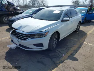 2021 Volkswagen Passat 2.0T SE with VIN 1VWSA7A39MC000409, listed as a IAAI auction lot 41804341 with 119,139 mi miles. Bid and sale history available at carsss.com. Image 2.