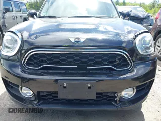 2017 MINI Countryman Cooper S z VIN WMZYT5C39H3D79798, wystawiony jako IAAI lot #42274782 z przebiegiem 96 669 mil mil oraz . Historia ofert i sprzedaży dostępna na DreamBid. Obrazek 6.